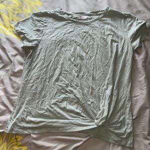 Maurice’s light green top